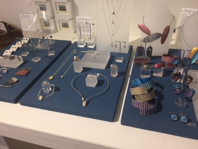 MakersWales's tweet photo. Come on in out of the rain and see our stand, no. 76, first floor @craftfestival Cardiff in City Hall - open until 5pm, and tomorrow until 4pm! Showing work by @kwillisjeweller @lmt77 @lisa_tann #HelenHigginsCeramics @ClareRevera @emmakatefrancis #mandynash @lliojames https://t.co/4TuVSfk1NZ