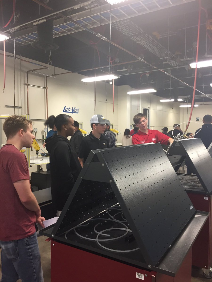 TX_Fame's tweet photo. Our AMTs giving our Open House attendees a tour around the AMT lab.
#txfame #amtprogram https://t.co/oGYowxMseP