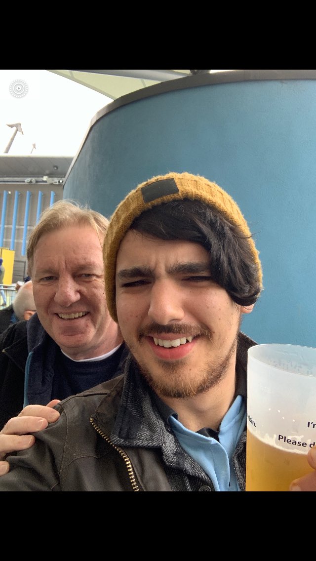 TheGlass_Lass's tweet photo. Dr. Jack L. Leonard’s 88th birthday celebrated in THE most appropriate way!! No’ 1 grandchild Jack Jnr with uncle Jonathan raising a glass at @ManCity 2-1 win helped by his divine intervention. Family team forever!!  #CTID https://t.co/WO8RhjRDMp