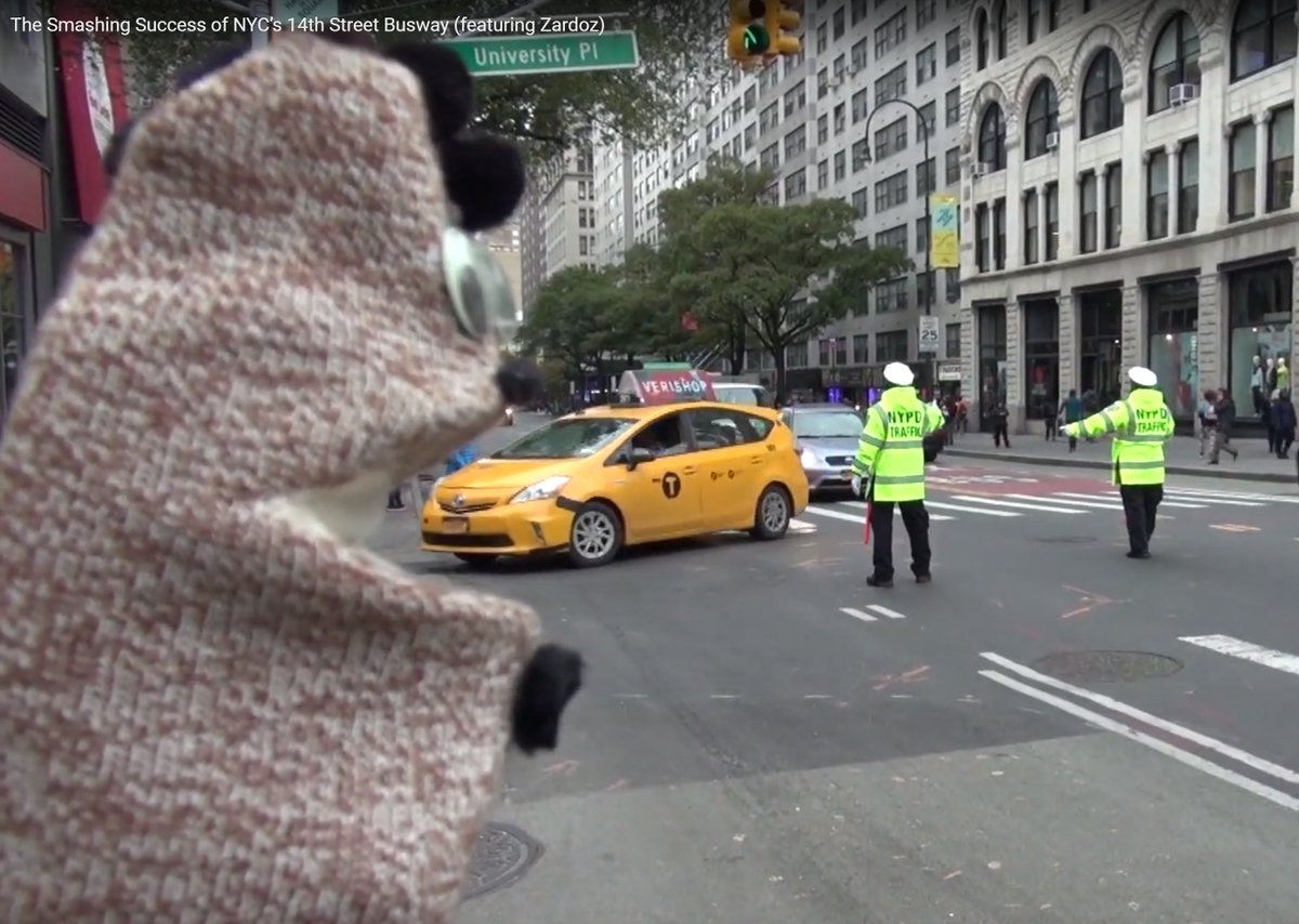 I love the new #StreetSafety mascot Zardoz! Look at him trying to eat this cab! Thank you @Streetfilms for this gem!