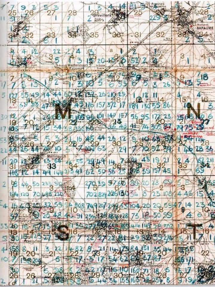 This is a body density map of part of the Somme battlefield.
Each small grid square is 250m by 250m &amp; the numbers written by hand, in blue, show the number of bodies recovered in each grid. 

At the going down of the sun,
and in the Morning,
We will Remember Them.