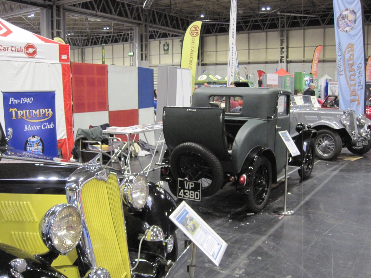 pre1940triumph's tweet photo. Three of our members are representing the club at @ClassicMotorNEC this weekend. Why not come and visit us in Hall 3 where we have a 1928 Super Seven Hoyal, a 1937 Gloria 14/60 Southern Cross, and a 1937 Gloria Fourteen Six-Light Saloon. https://t.co/g3GzIXUd0n