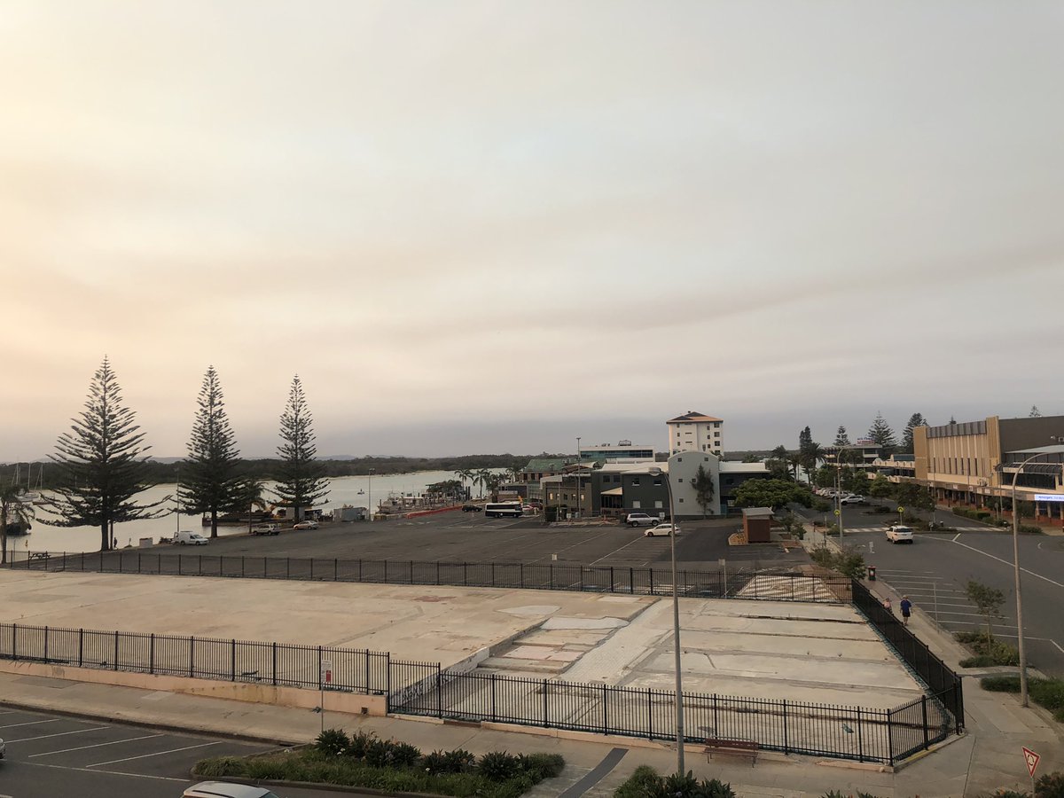tweetcloudtalk's tweet photo. Kudos to @NSWRFS. The sky looks a bit better today, still haze from other fires; but warnings issued for Tuesday #NSWfires #bushfires #portmacquarie https://t.co/k9NlMQyCzk