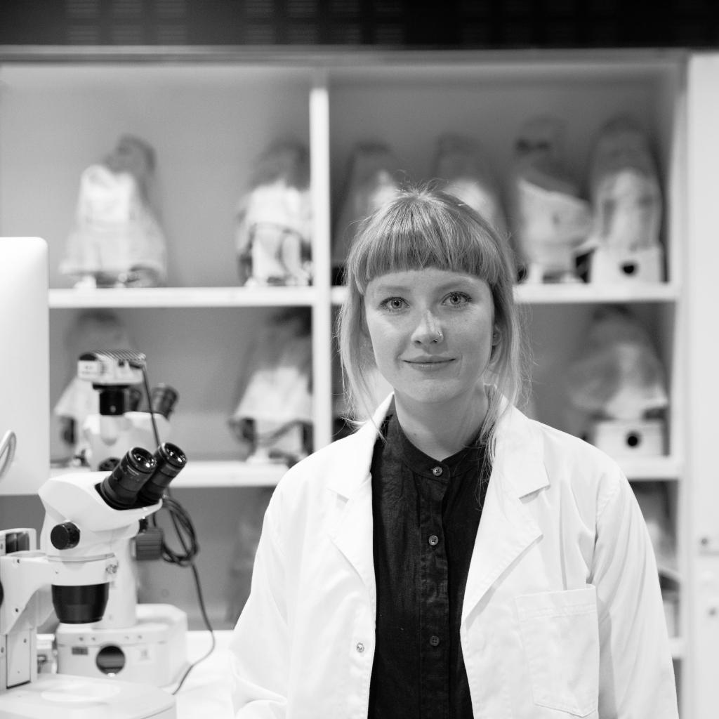 female in laboratory, black and white