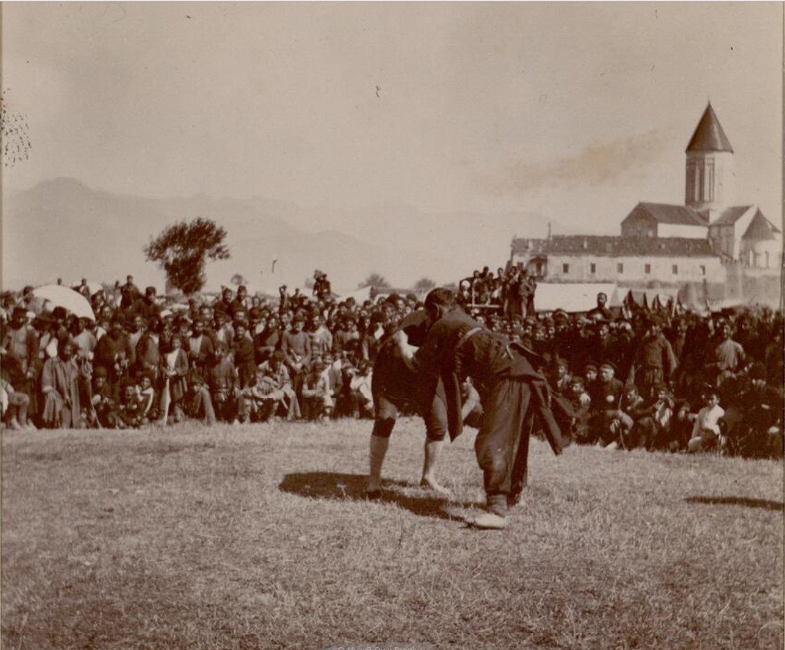A Georgian man wrestling with an Azerbaijani in Alaverdoba festival.Joseph de Baye (1853-1931) - Au sud de la chaine du Caucase : souvernirs dʹune mission (published in 1899)