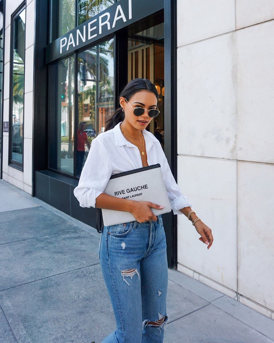 italist on X: You can wear your #SaintLaurent Rive Gauche Bag as a clutch  like #italisticon @michelleinfusino or even use it as a pouch in a larger  tote. Shop it now at