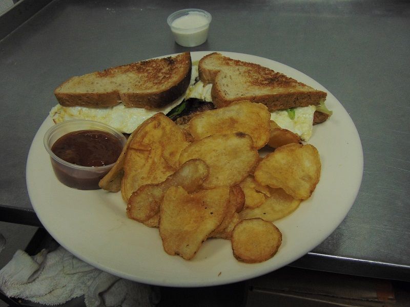 KitchenTableWI's tweet image. Today is #NationalSandwichDay! This tasty holiday can be observed by serving yourself and loved ones a delicious sandwich, OR by stopping by The Kitchen Table for a Reuben, Mouse Traps, or BLT (pictured here with eggs.) 🍞 🥓 🥔 🧀 🍞