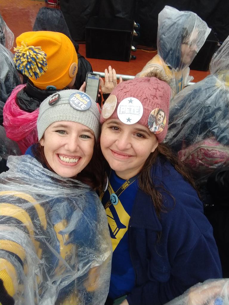 EmrinJade's tweet photo. @DanaBashCNN @CNNSotu My sister @carliemonett and I drove up from Louisville, CO on our own time and dime, waited in the cold rain for hours all because we believe in @PeteButtigieg.  This is what hope looks like friend. https://t.co/XksTJw4pfQ