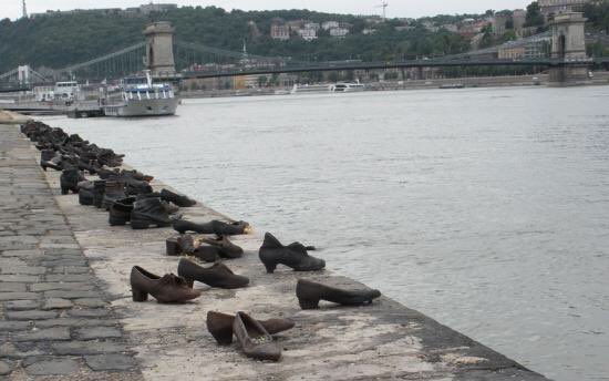 SalomonSoup's tweet photo. Shoes on the Danube Bank.👞 
A poignant memorial for the victims, including 800 Jews, murdered here in Budapest during WWII. 
They were ordered to take off their shoes &amp; were shot at the edge of the water. The cast iron shoes represent the ones left behind on the river bank. https://t.co/eJnM9XXAIV
