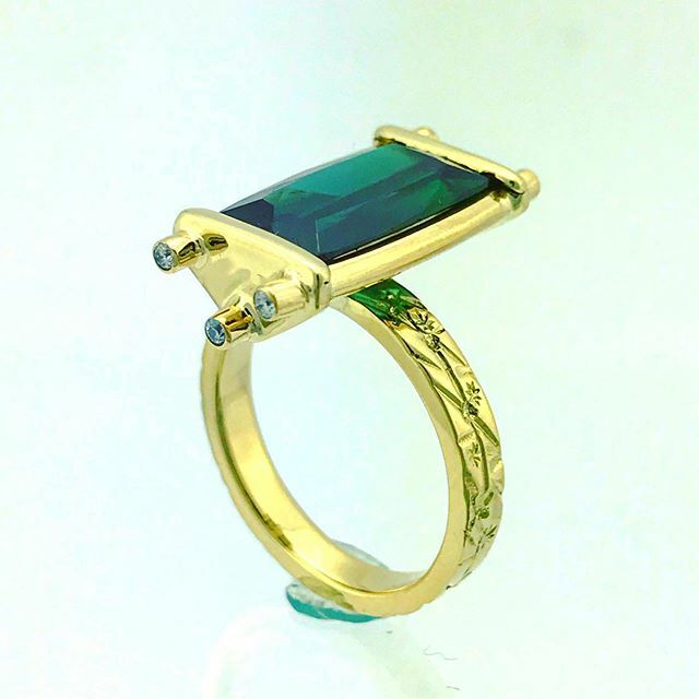 Another angle in the new Triple Tube set ring with an intense blue green tourmaline in 18k gold with diamonds #jewelry #jewelrydesigner #ring #tourmalinering #tourmaline #indicolite #oneofakindjewelry #oneofakinddesigns #gold #diamond #specialjewelry #we… ift.tt/2JMaqkz