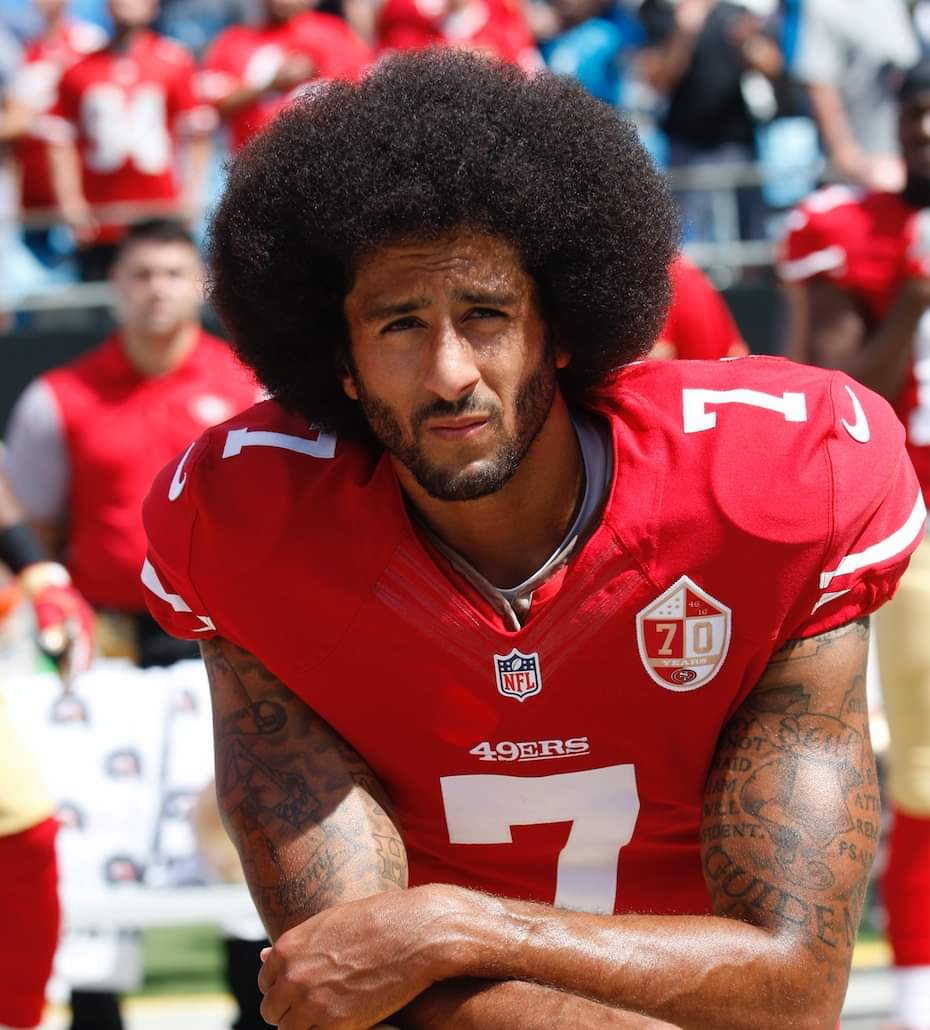 \"Happy Birthday to you Colin Kaepernick! We stand AND kneel with you.  || Michael Zagaris/Getty Images\" - BET 