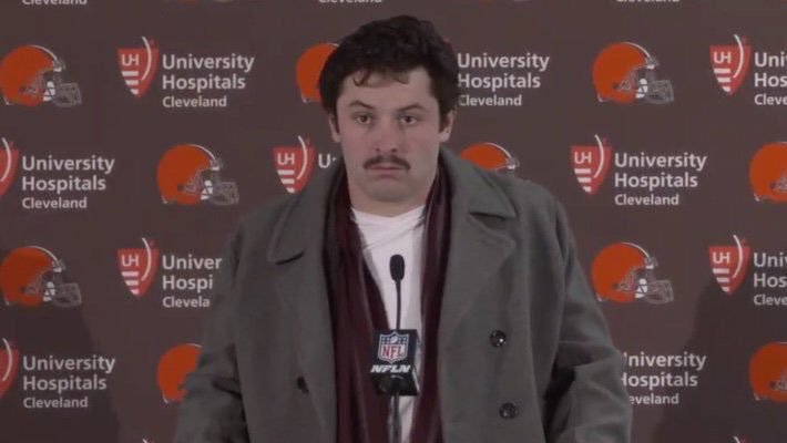 Baker dressed like he's about rob Macaulay Culkin's house with Harry and Marv