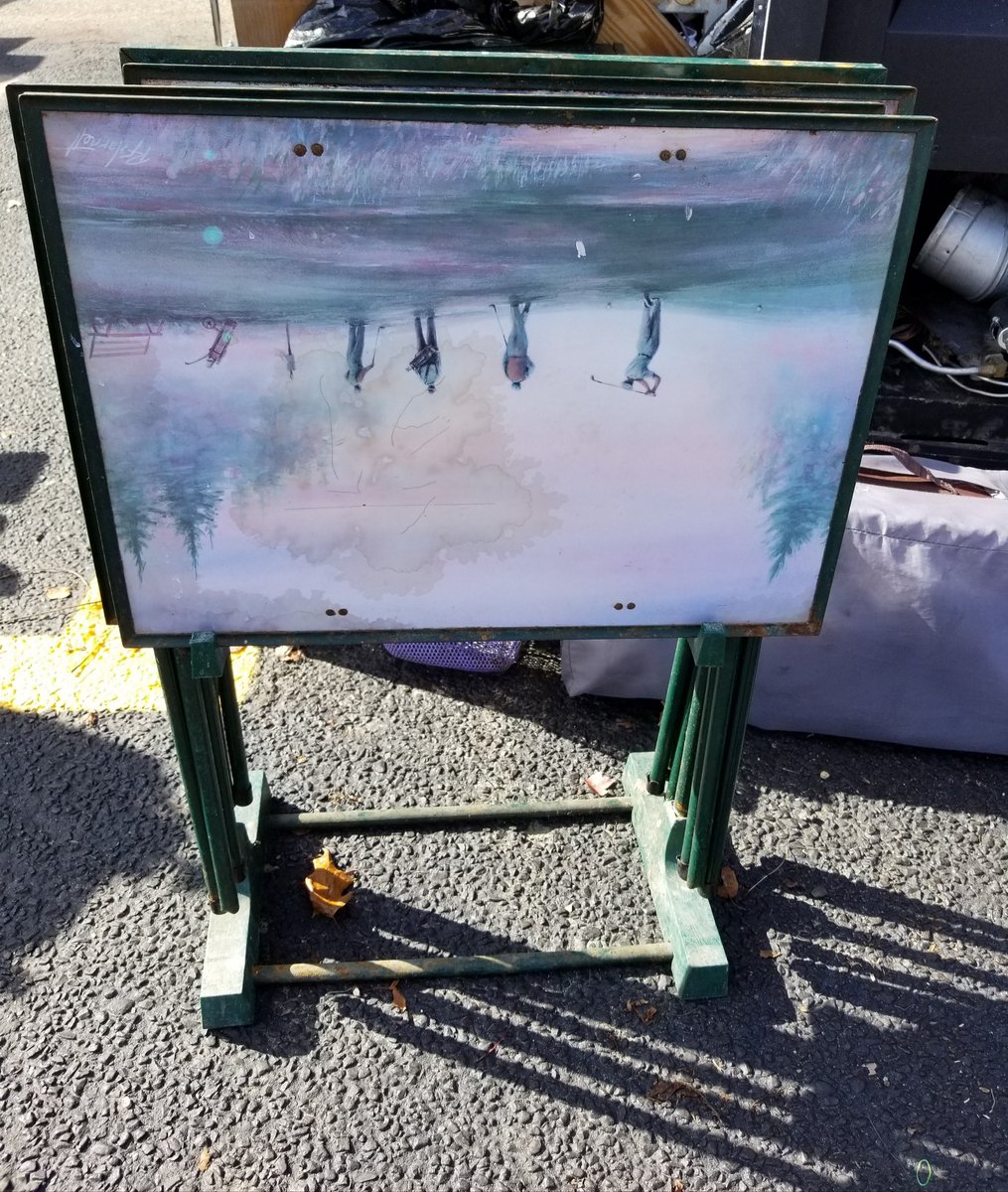 ~And now for something completely unrelated to anything else I've posted recently. This is a four piece tray table set, with different golf themes on each one. I'm amused.