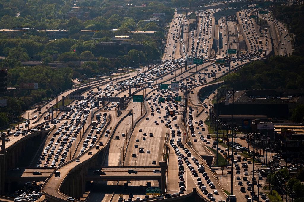 They TRICKED us into believing that cars = freedom… that parking is a “human right”… that busses are to be avoided at all costs, bicycles are a menace… that apartments buildings are an eyesore and highways are somehow “beautiful.”