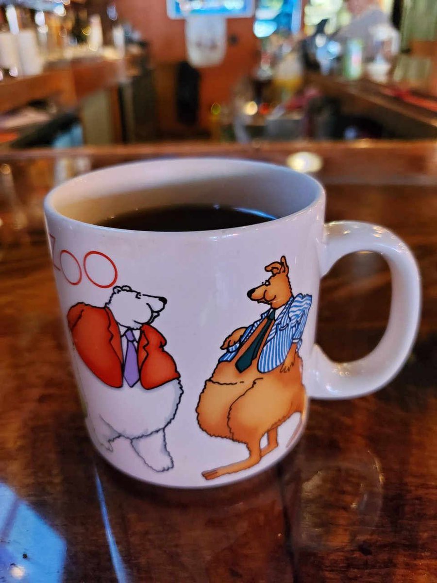 KitchenTableWI's tweet image. The characters on this mug have the professional attire on-point from the waist up, but where the heck are their pants!? LOL Share your mug in the comments below and use #MugMonday! ☕️