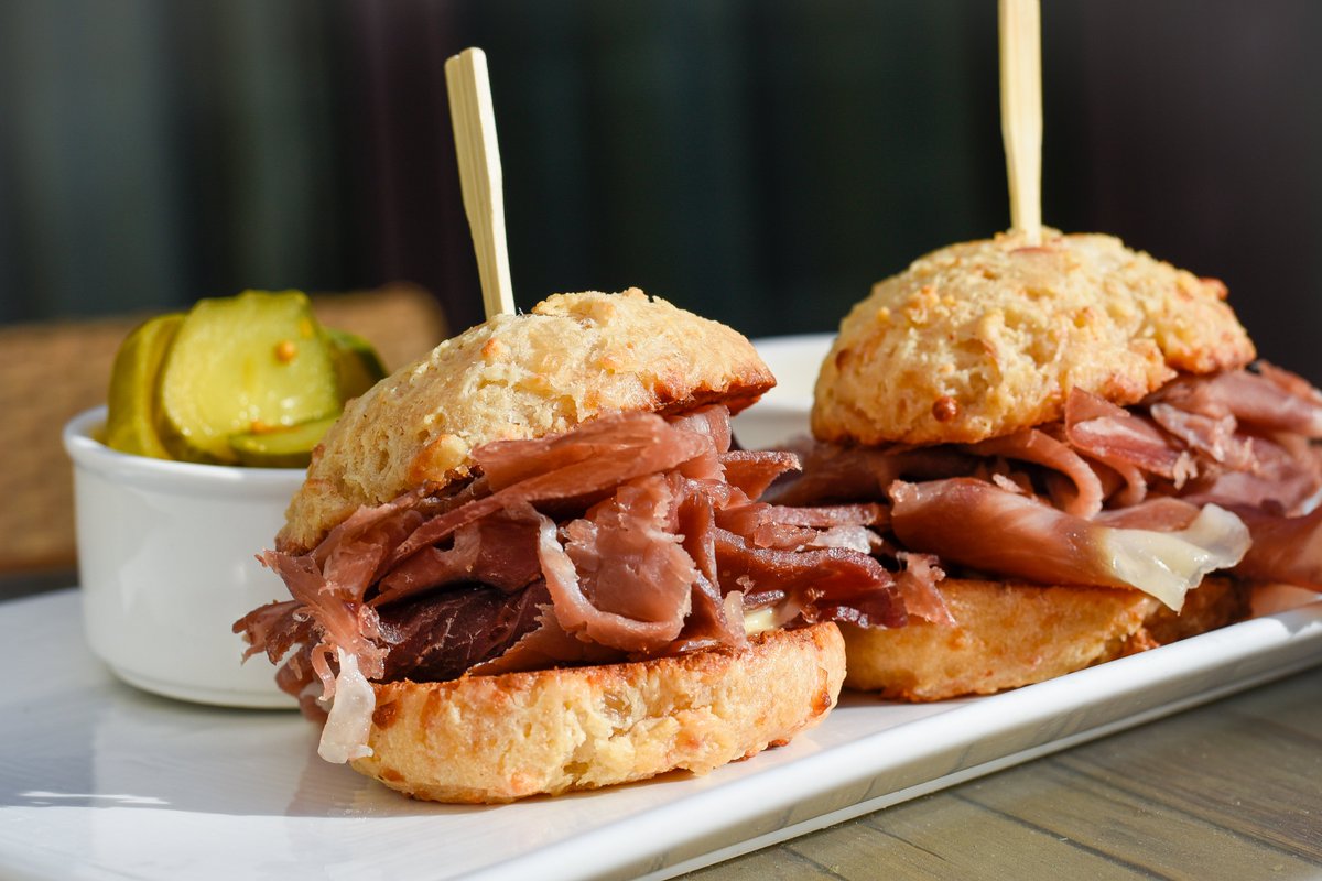 Small plate, big flavor. Indulge in Benton’s Tennessee Ham &amp; Corey’s Cheddar Biscuits from Rattlesnake Bar. #FearingsDallas