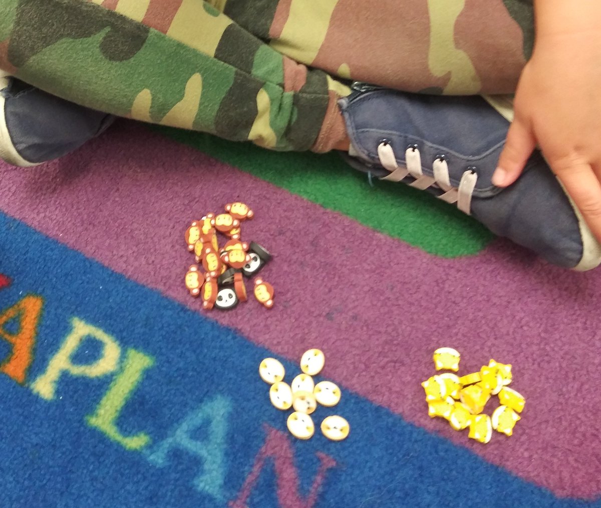 lwaterfield13's tweet image. This creative thinker sorted differently. She described to us that the pandas and monkeys had the same shape ears. 🐵🐼 #categorizing #howaretheysimilar?