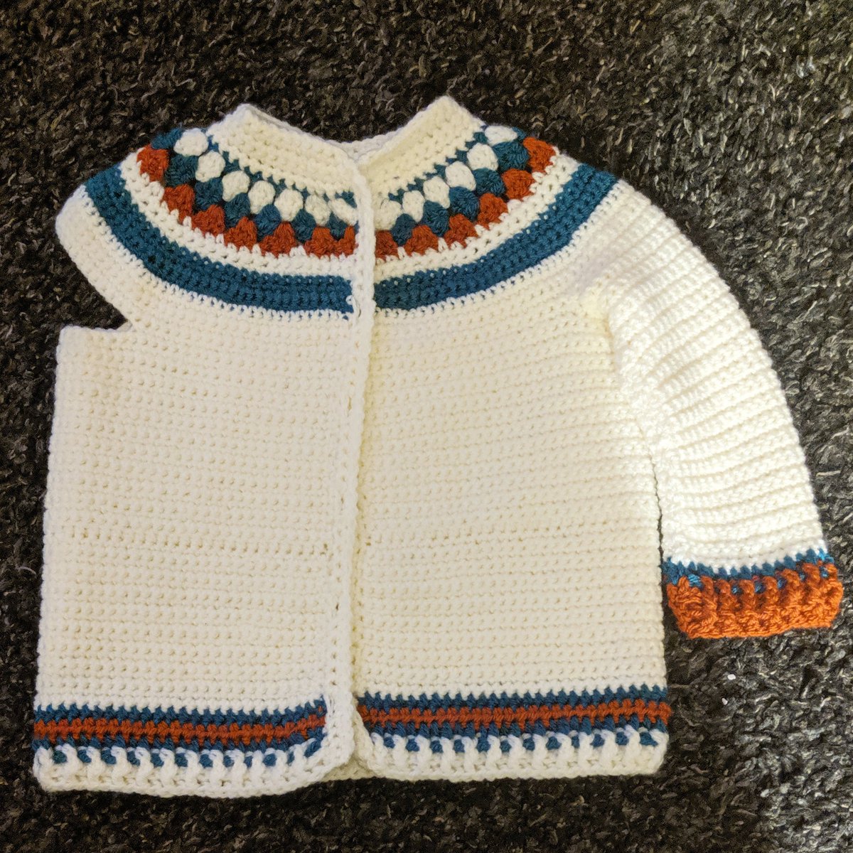 Artyarn2's tweet photo. #sweetyolkbabycardigan is nearly done. Just one arm to do and 5 buttons to sew on! #crochet #aranyarn #crochetkidsclothes #makingclothes #handmadeclothing https://t.co/bDtODtByzV