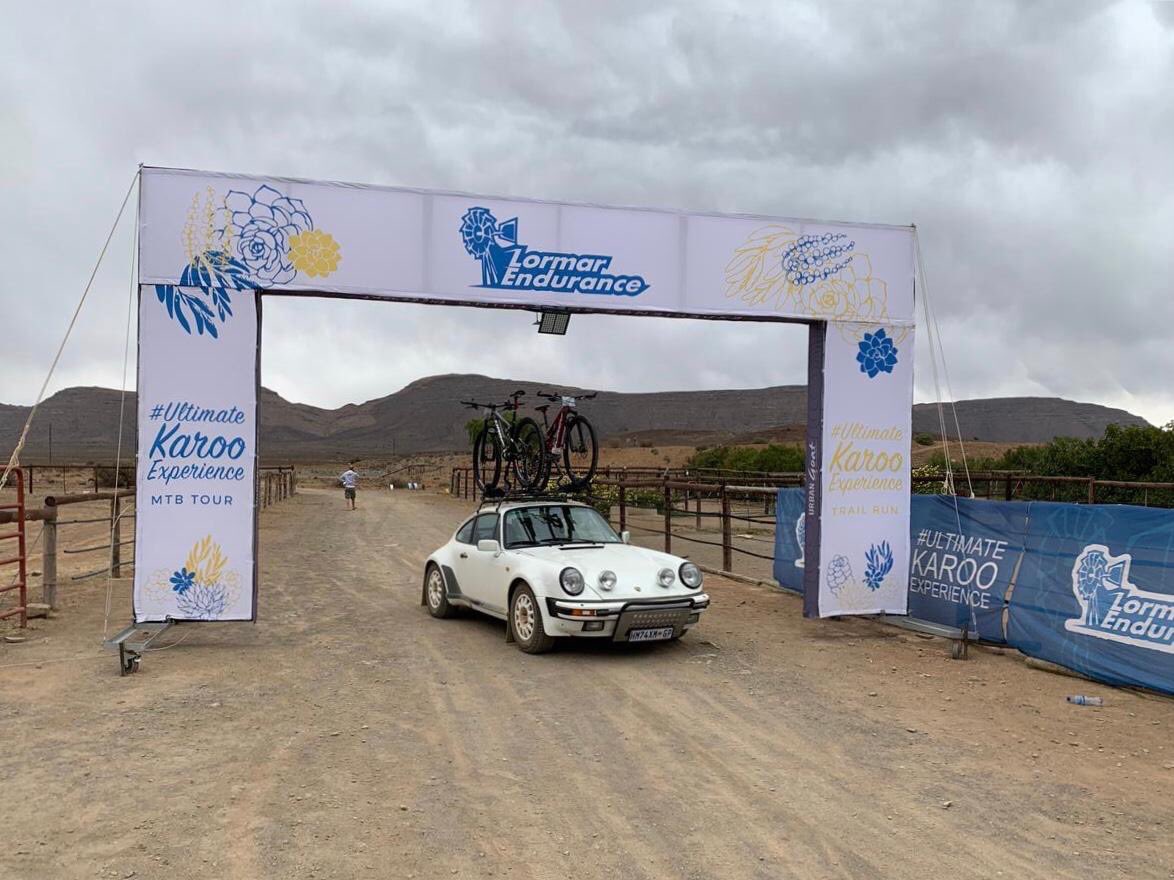 #KarooStories

Who says a Porsche can't go on gravel? This year we had two Porsches that arrived at the Tour! When asked during dinner at prize giving: Why on earth would you drive your Porsche on Karoo gravel road? The answer was simple: Because I can!