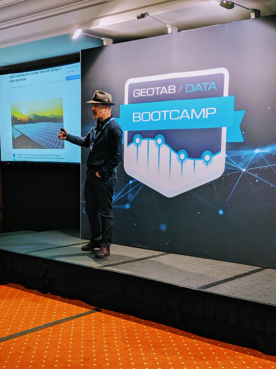 GEOTAB's tweet photo. Tom Raftery from @SAP talks to @GEOTAB Data Bootcamp attendees in Estoril, Portugal about renewable energy and future trends in transportation. To learn more visit: https://t.co/l46RkiWSLj https://t.co/uVwDFIWg84