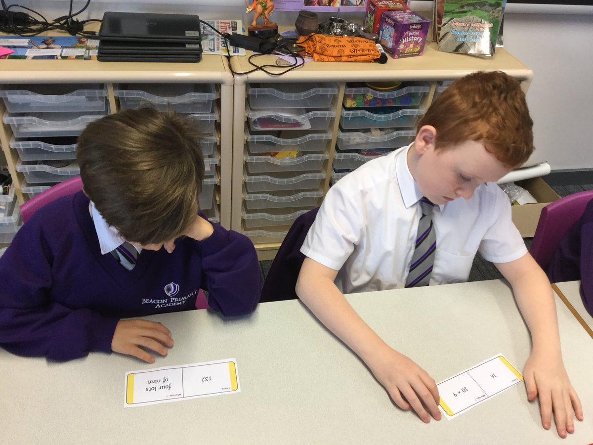 BeaconAcad's tweet photo. Yr5 are challenging themselves with #timestables loop cards. We are going to revisit them often to see if we can beat the time it takes to get around the whole class. Today it took 4m57s. #leopardclass https://t.co/iEFemLiA75