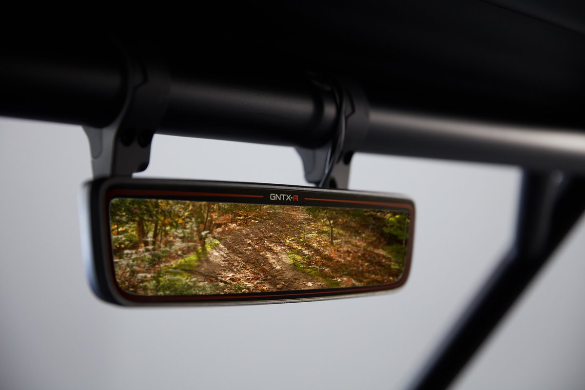 GentexCorp's tweet photo. If you love off-roading, stop by the #Gentex booth @SEMASHOW. This Polaris #RZR features a SmartBeam controlled light bar, R-Series #FDM, and a #Michigan-themed Wrap. Plus, our heavily modified Chevy Colorado with more enhanced tech this year! #sema2019 #technology #automotive https://t.co/anPapR65am
