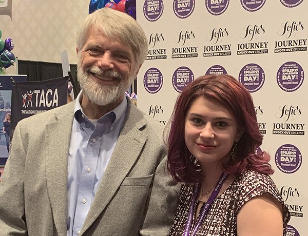IlaeWeb's tweet photo. ILAE's Ed Bertram and Sofie Levy at Epilepsy Awareness Day 2019 at Disneyland Resort. Sofie's seizure freedom after epilepsy surgery inspired her parents to create the gathering seven years ago. It's now grown to more than 5,000 registrants #knockoutepilepsy #epilepsy https://t.co/CMbEVpo5Ni