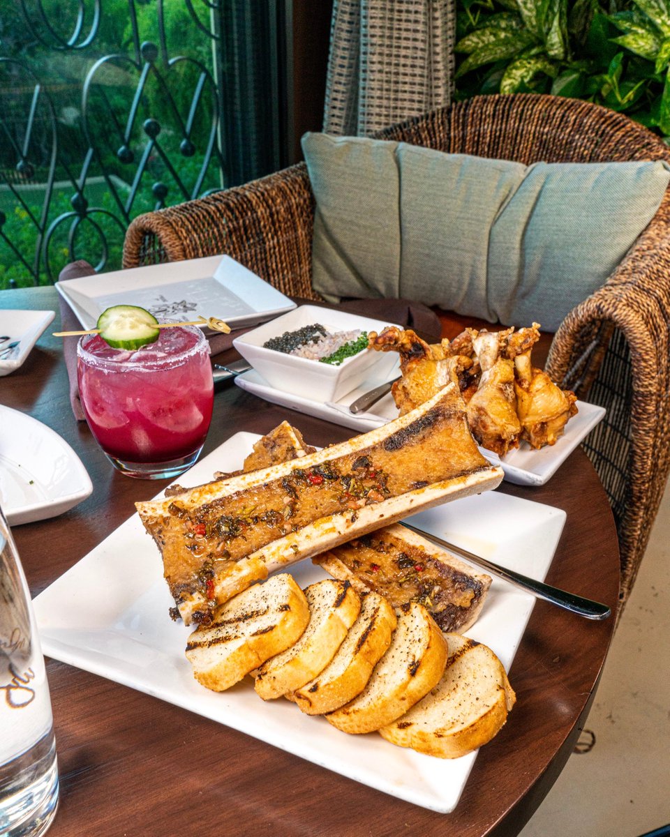 Indulge with the Bone Marrow, topped with onion jam and chimichurri and served with toasted baguette slices. #lacavelv