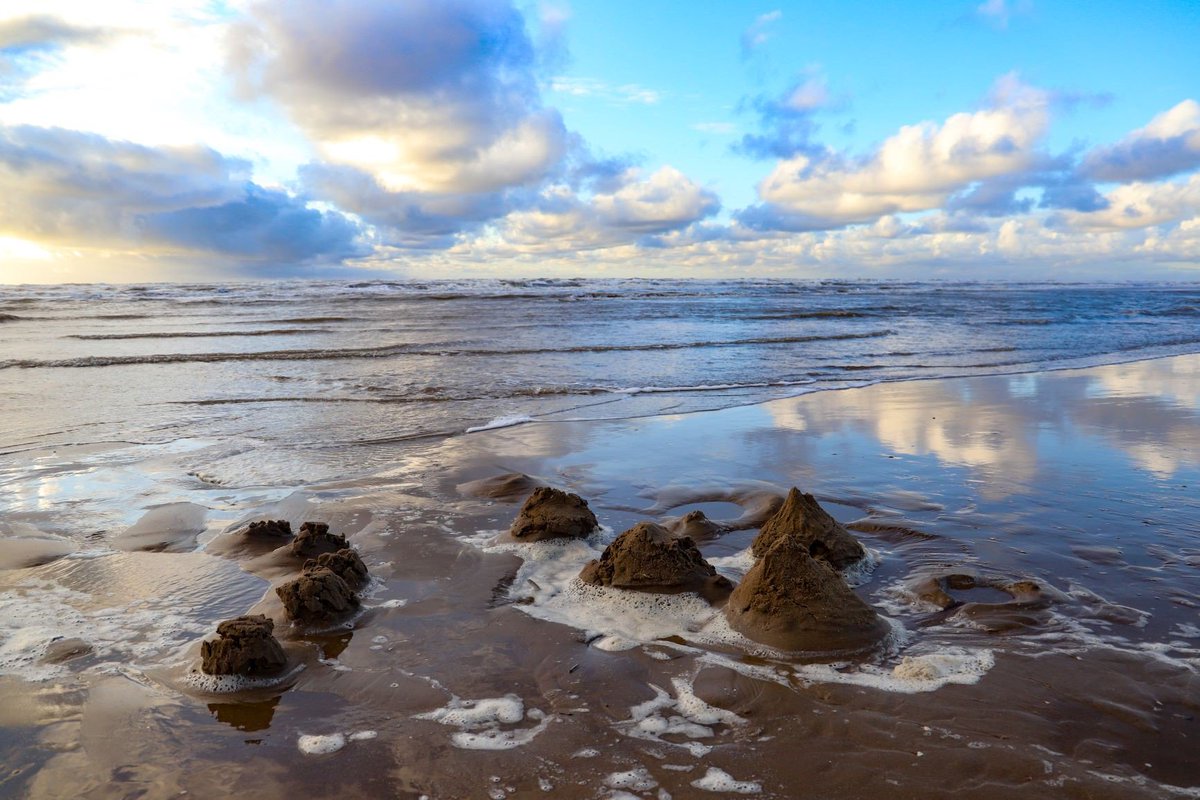NT_Cultural's tweet photo. 5 National Trust beaches were sculpted into thousands of mountains of sand to form micro-geologies as part of #FirstThereIsAMountain by @ktmpaterson - a touring participatory artwork. Here are some snaps from @NTFormby &amp; @BrancasterNT last month. Thanks to everyone involved! https://t.co/rrdBhqnlKU