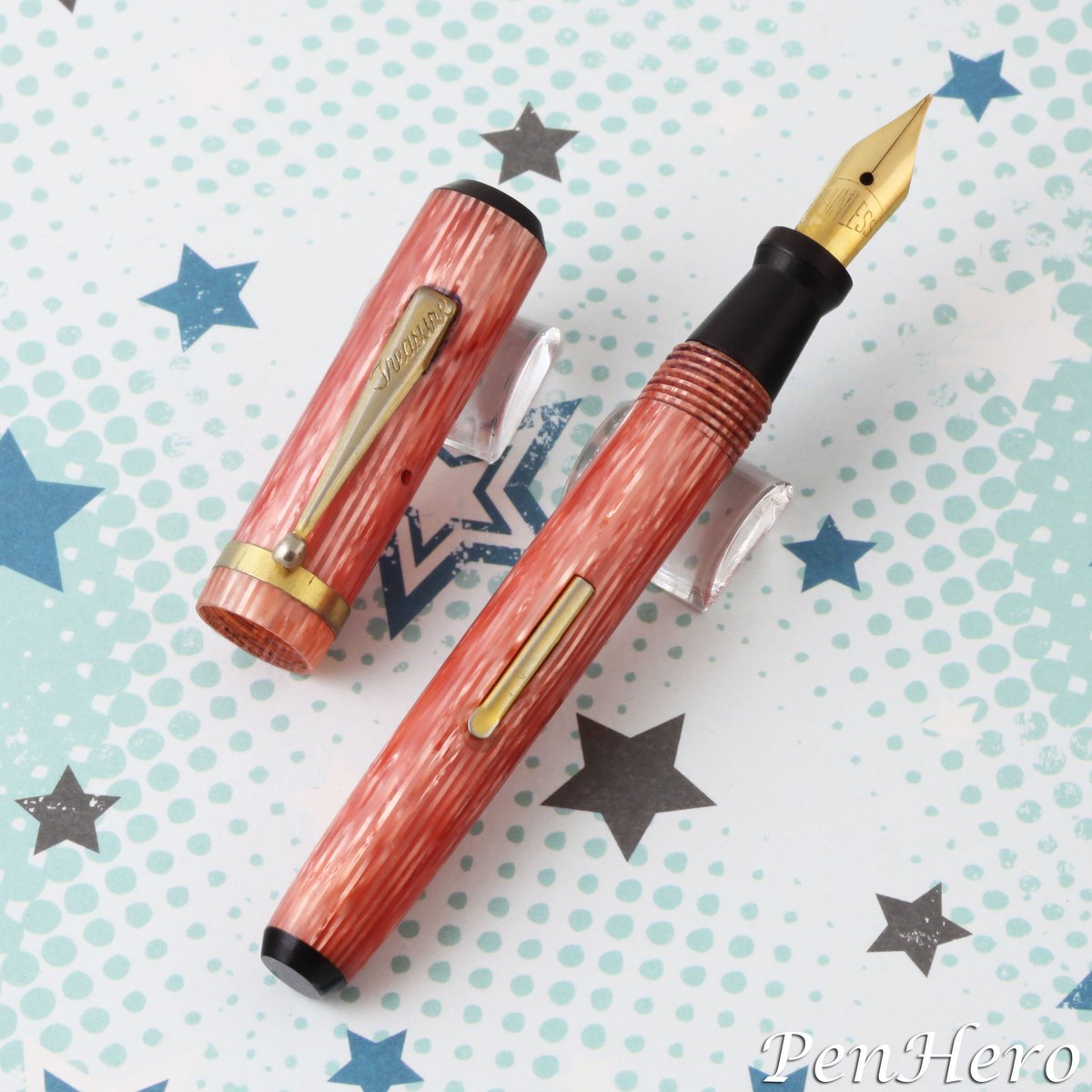 PenHero's tweet photo. Treasure fountain pen in pink orange striped celluloid c. 1934-1939
#fountainpen #wearever #davidkahn #treasure #treasureisland #mutinyonthebounty #celluloid #penhero https://t.co/yEH1y75TIO