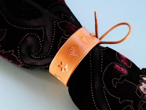 Be right on-trend by using this handmade leather bracelet as a shawl cuff / scarf cuff!!   #hearts #stars #leather #shawlcuff #scarfcuff #bracelet #leatherbracelet #leathercuff #handmade #handmadegift #handmadeleather #gifts #shopsmall #shophandmade buff.ly/2N67d1d