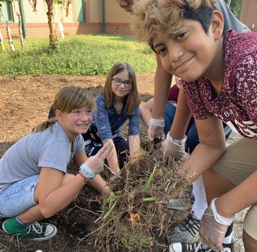 nc5service's tweet photo. Fifth grade has done an amazing job keeping the courtyard clean and watering the flowers around Noble Crossing!  #FifthGradeServiceProject https://t.co/BAb4BnOArm