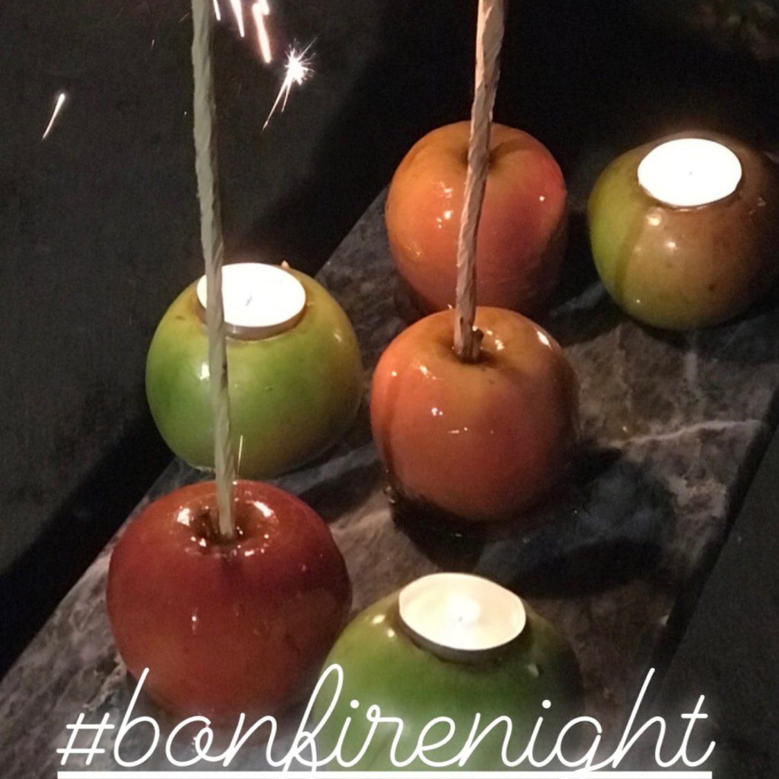 Sharing sticky toffee apples, sparklers and a roaring fire with friends &amp; family in the #lakedistrict is #bonfirebliss! #bonfirenight #marbleboard #bonfiretreats