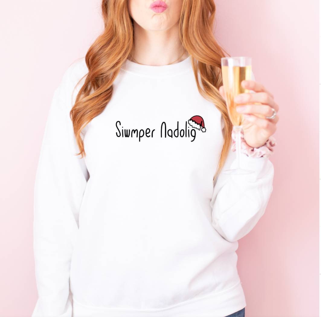 TeapotEm's tweet photo. Excited to share the latest addition to my #etsy shop: Welsh Festive Christmas Sweatshirt. Womens Festive Christmas Jumper. Festive slogan sweatshirt. Christmas festive. Siwmper nadolig. Nadolig https://t.co/ciTtdU62Bz https://t.co/iwc6vVaz2y