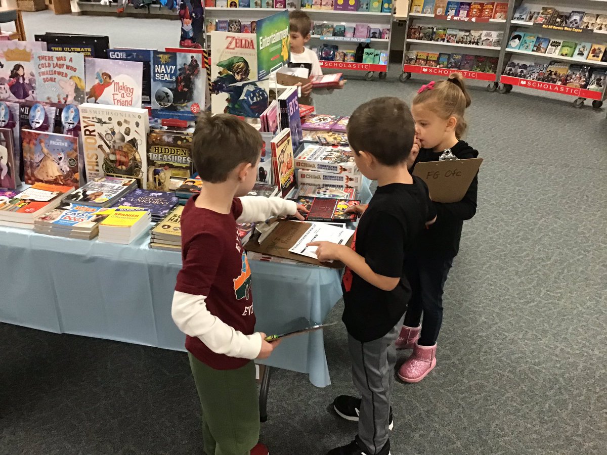 AprilsKinders's tweet photo. Stop by the Scholastic Book Fair while you’re at conferences! The kids are writing down the titles of their favorite books on their Scholastic Book Fair Wish Lists 💜📚 #LoveReading https://t.co/gGyGKz01mP
