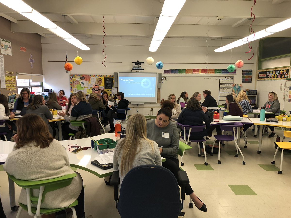 weaver_jen7's tweet photo. Making the most of parent teacher conferences. @agcharter teachers collaborating on ways to make their time with families meaningful. #iamagcs https://t.co/JnYK0Gylun