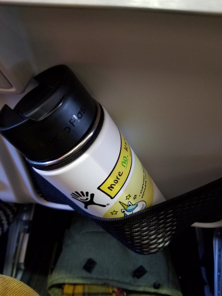 dominicad's tweet photo. Many thanks to the designer who designed the new @AlaskaAir seat pockets to easily hold a water bottle. You have a happier customer.😃 https://t.co/Jm3XVaRu9R
