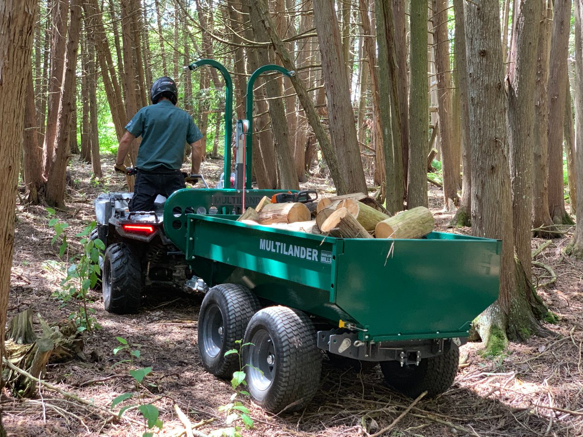 WoodlandMills's tweet photo. The rugged #Multilander Logging Trailer is the ultimate landowner companion. Featuring a heavy-duty chassis capable of an impressive 2000 lb load capacity. Designed to be towed off-road behind your #ATV, UTV, or tractor & features an industry-first adjustable wheel track width. https://t.co/izNRkqHGWe