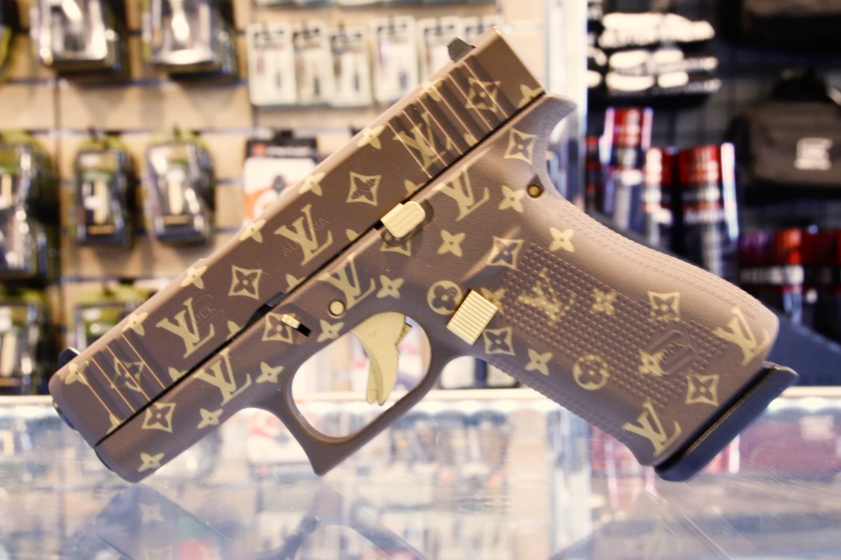 pink louis vuitton gun