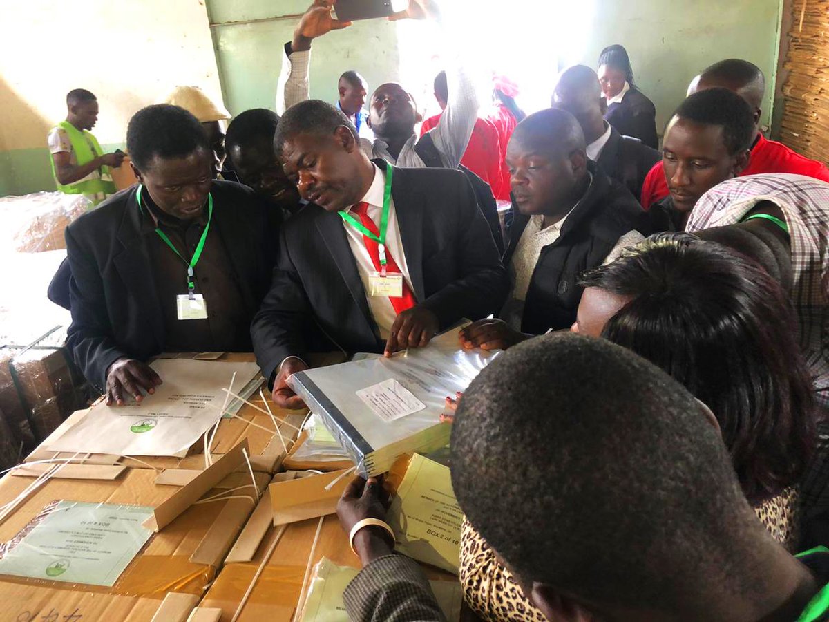 IEBCKenya's tweet photo. Chief Agents of Political Parties and Independent Candidates witnessing unsealing of Ballot Paper Pallets at the Tallying Centre at Nairobi City County Inspectorate Training College. #byelections2019 https://t.co/hNwk5LpkfE