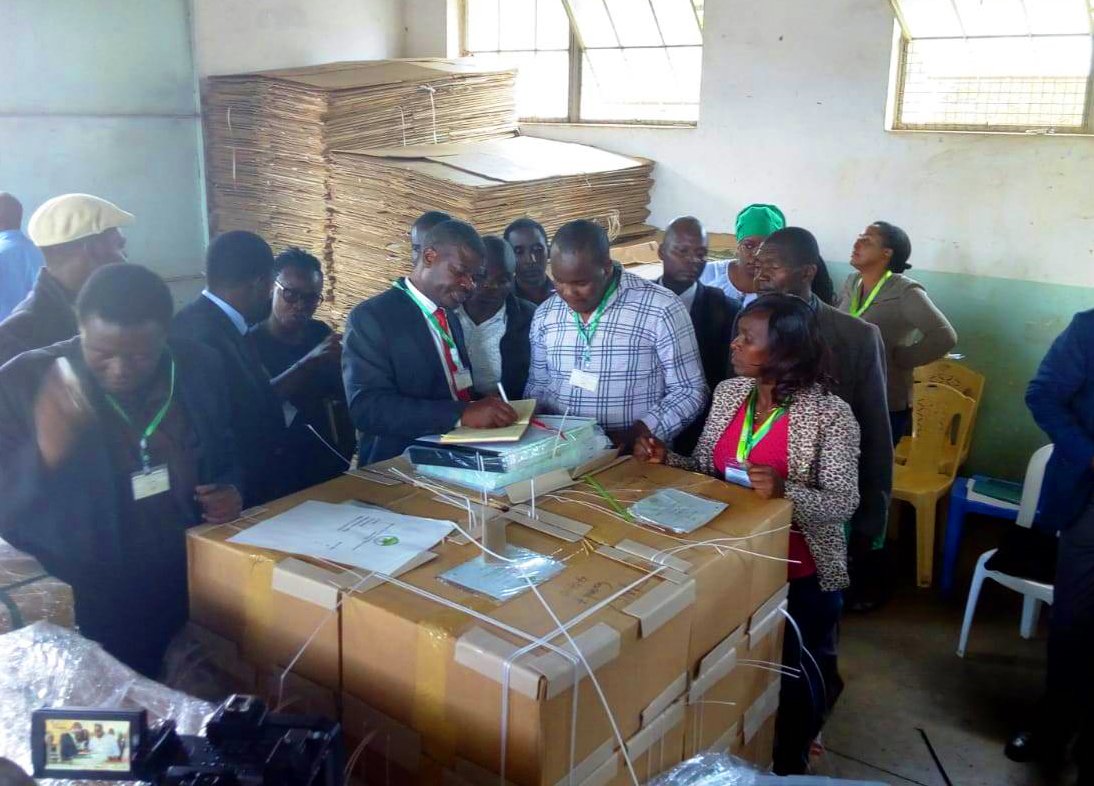 IEBCKenya's tweet photo. Chief Agents of Political Parties and Independent Candidates witnessing unsealing of Ballot Paper Pallets at the Tallying Centre at Nairobi City County Inspectorate Training College. #byelections2019 https://t.co/hNwk5LpkfE