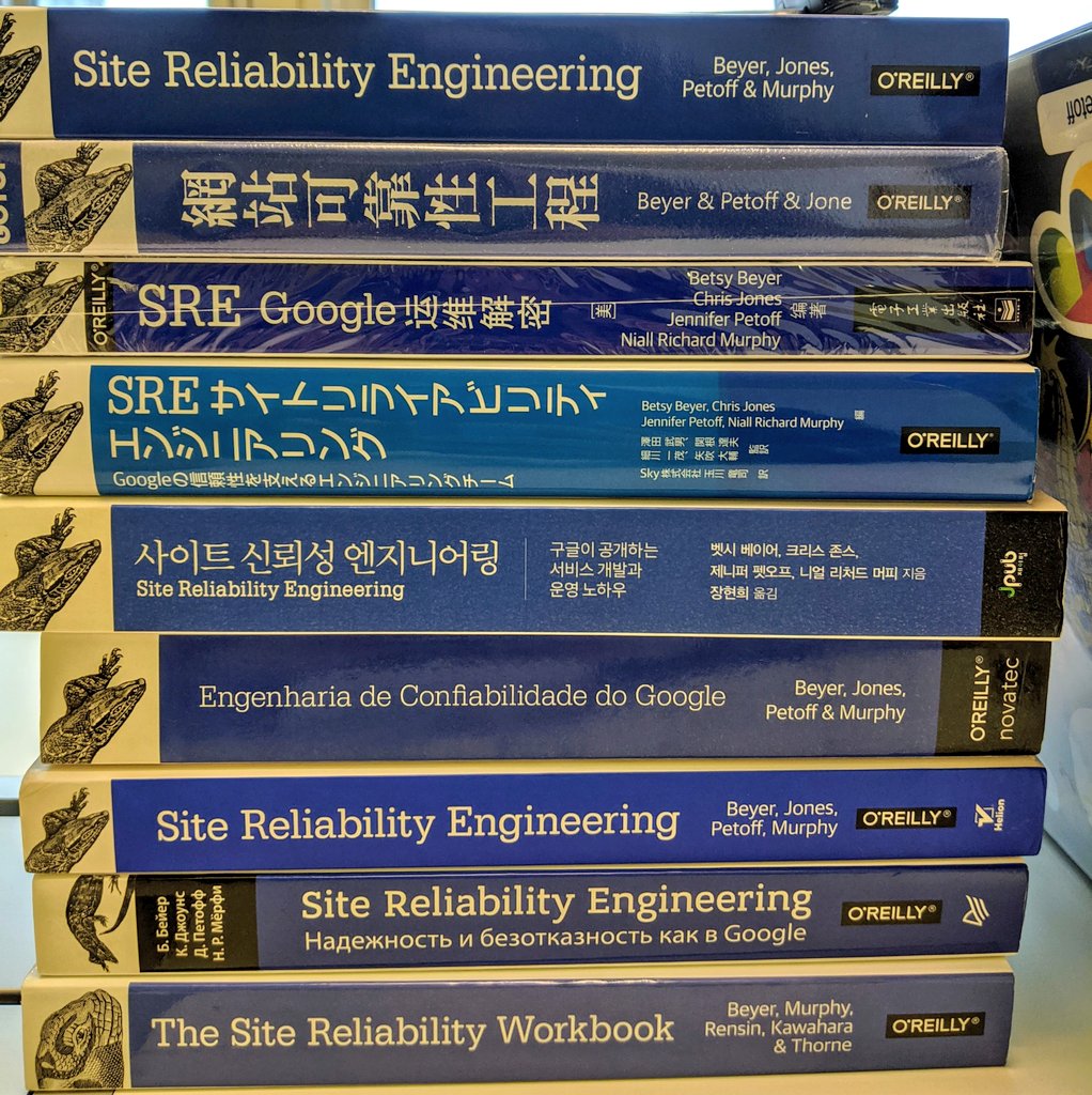 I may not have a studio to present from for #AllDayDevOps but I'm pretty happy with my makeshift set-up. I get to put all the international editions of the SRE Book to good use 🙂
