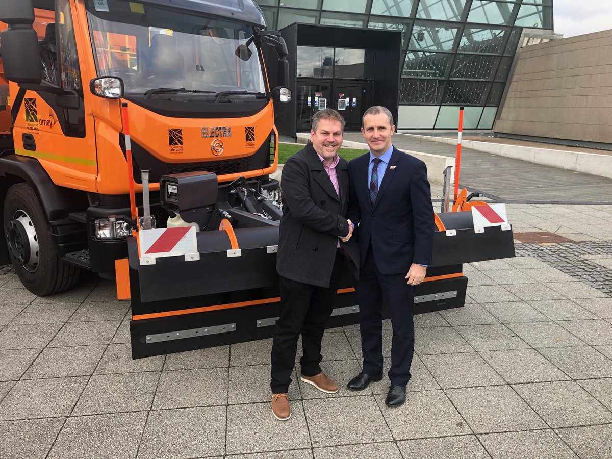 ⁦@MathesonMichael⁩ and I beside the cutting edge fully electric gritter and plough. Scotland at the forefront of innovation #keepscotlandmoving ⁦@RHANews⁩