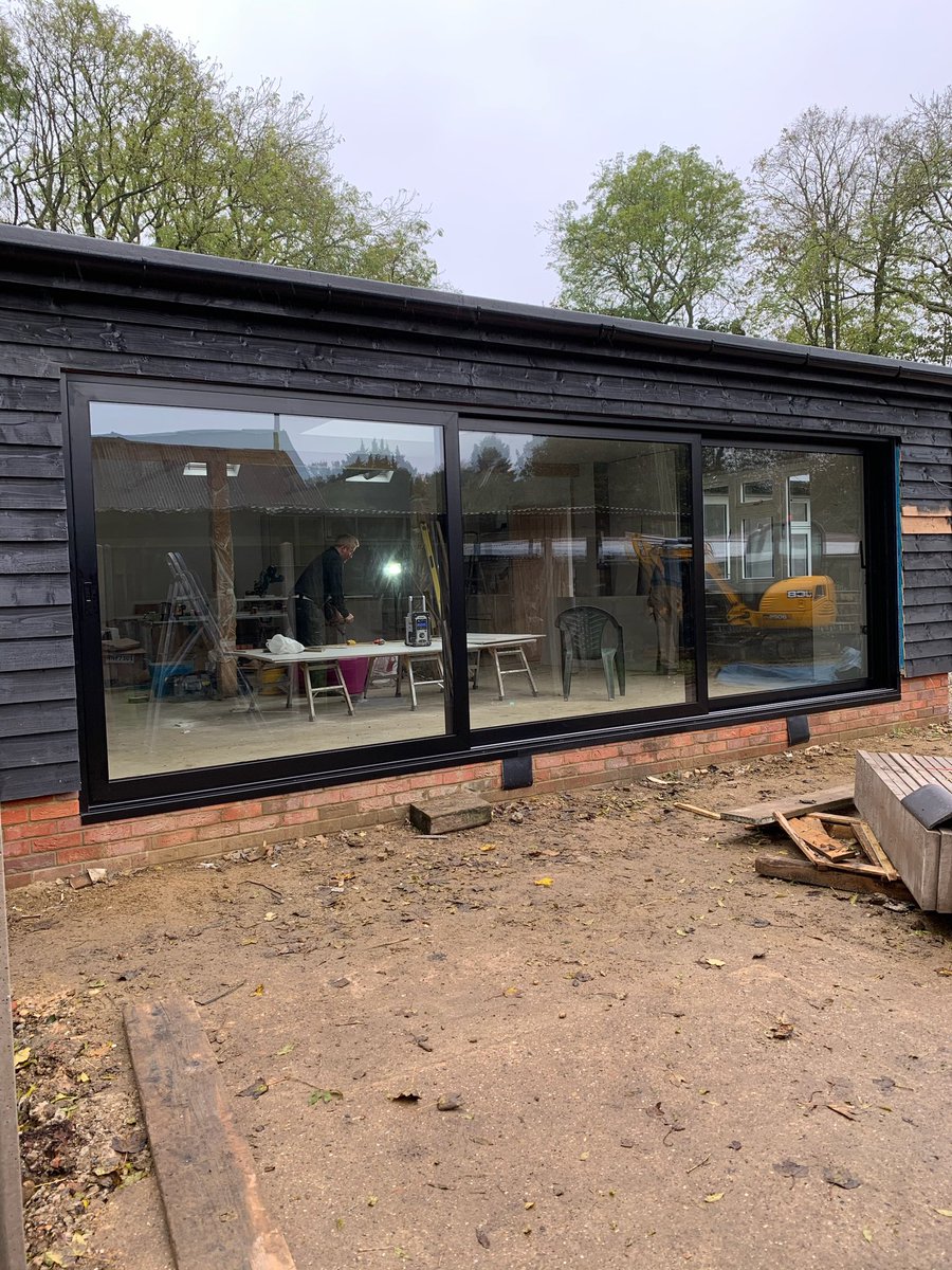 Just what this barn conversion needed 😍Here we installed our Reynaers Cp130LS patio doors finished in 9005M satin black and R9 timber alternative flush windows and French doors finished in painswick woodgrain externally and white woodgrain internally. All manufactured in house👌🏻