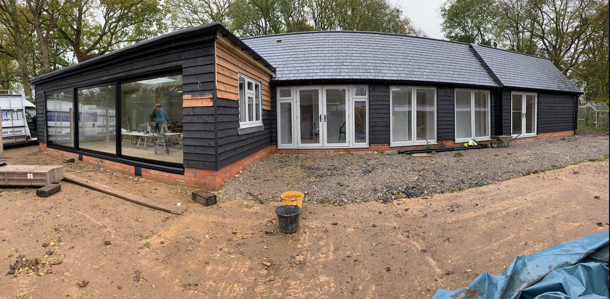 HarpendenWindow's tweet photo. Just what this barn conversion needed 😍Here we installed our Reynaers Cp130LS patio doors finished in 9005M satin black and R9 timber alternative flush windows and French doors finished in painswick woodgrain externally and white woodgrain internally. All manufactured in house👌🏻 https://t.co/mmZrIFOU3C