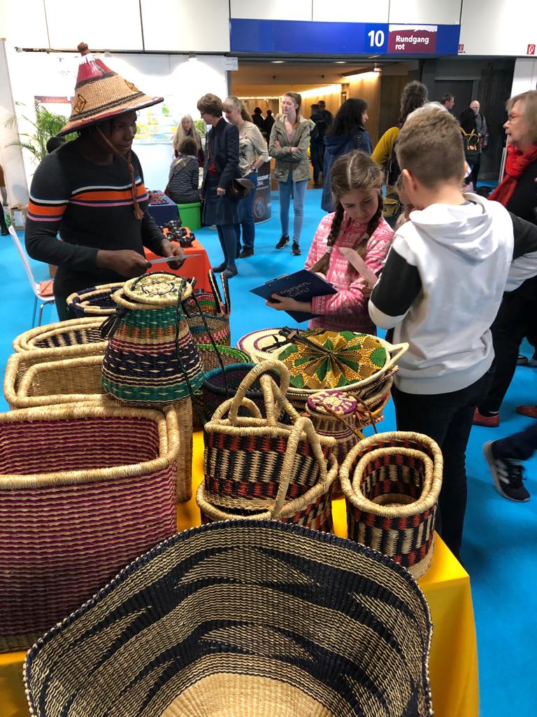llysa200's tweet photo. It's bazaar day 1 at the Fairtrade event in Germany. As these baskets are sold, the lives of many rural women in the Upper East Region of Ghana will be transformed. @Camfed @ApooreDorcas @youngafricawks https://t.co/oNYbILfQHN