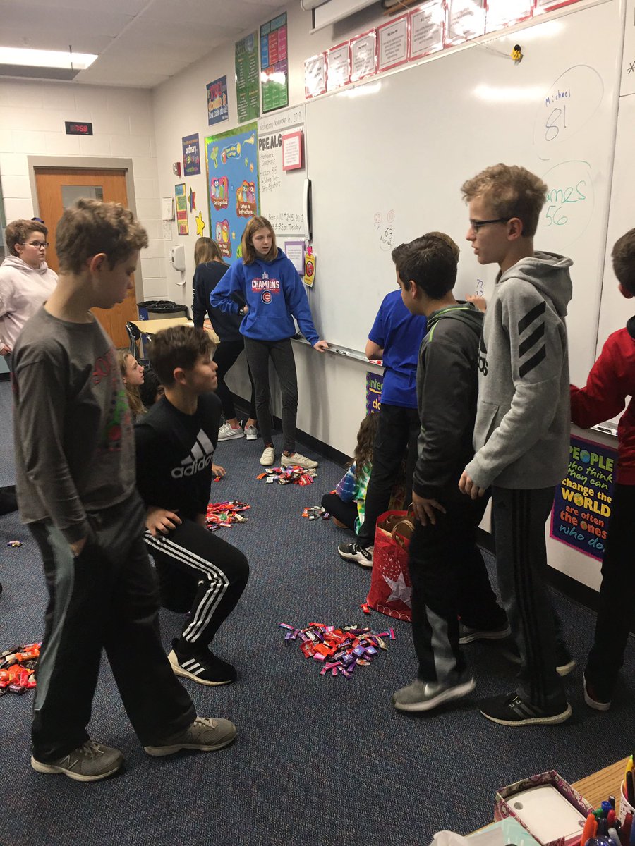 7E-2 students <a href="/AHSD25South/">South Middle School</a> counting candy donations for Treats for Troops!  Can they meet their goal of 2000 pieces?