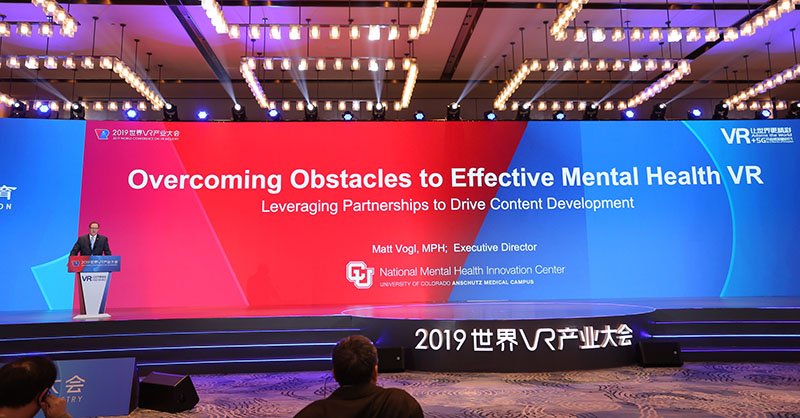 CrazedPodcast's tweet photo. NMHIC travels across the globe to share insights on virtual reality for mental health!
Matt Vogl, NMHIC Executive Director, speaks at the World Conference on VR Industry in Nanchang China.
#virtualrealilty | #mentalhealthawareness https://t.co/XC39WSfl47