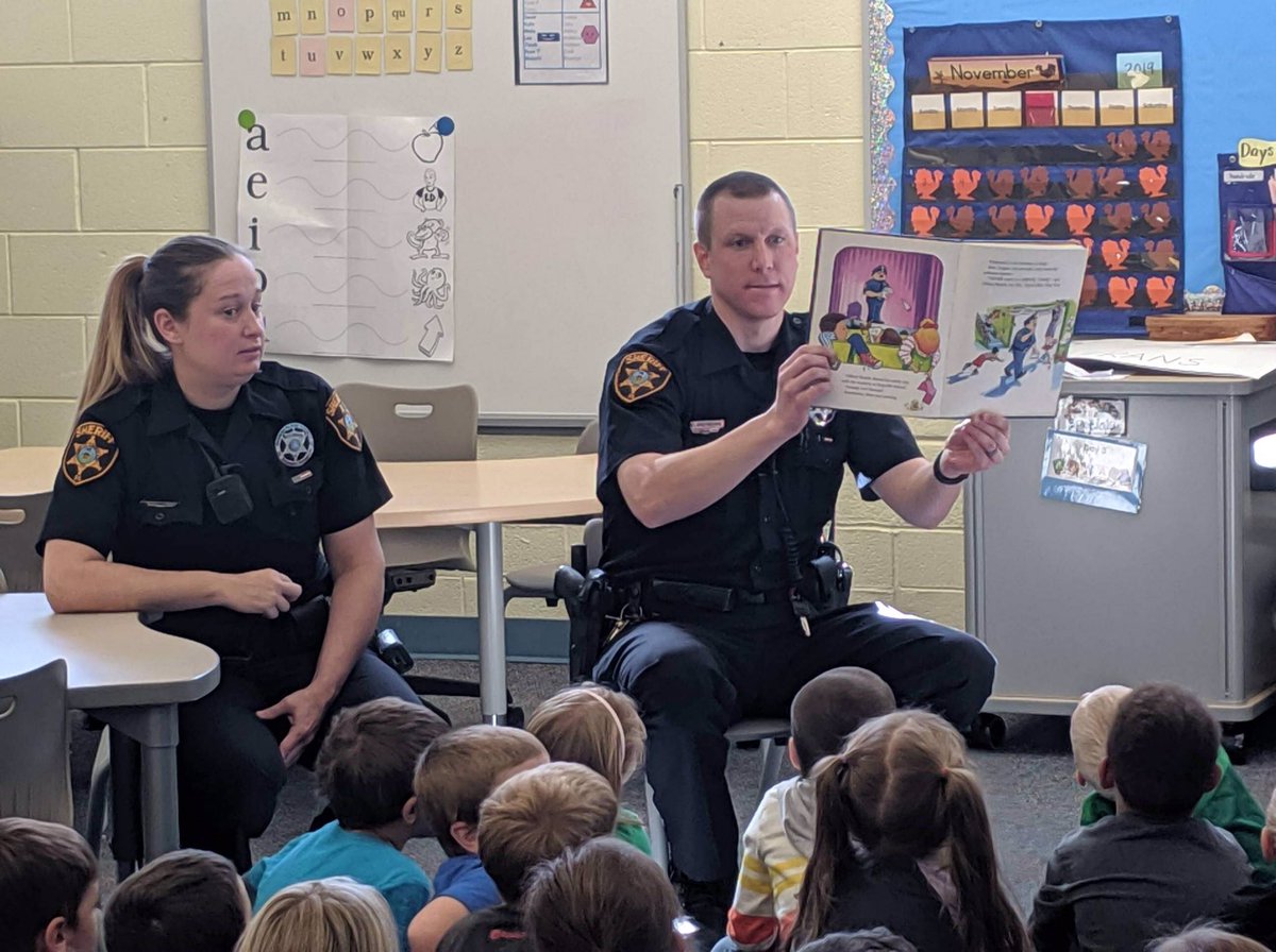 CrystalHeader's tweet photo. Our Resource Officers came to read to Kindgergarten today. When they started to read, a student asked who the author was!  Wonder what we’ve been working on for read aloud standards....#mountrockengaged #bssdproud https://t.co/HlzSwcNxqp