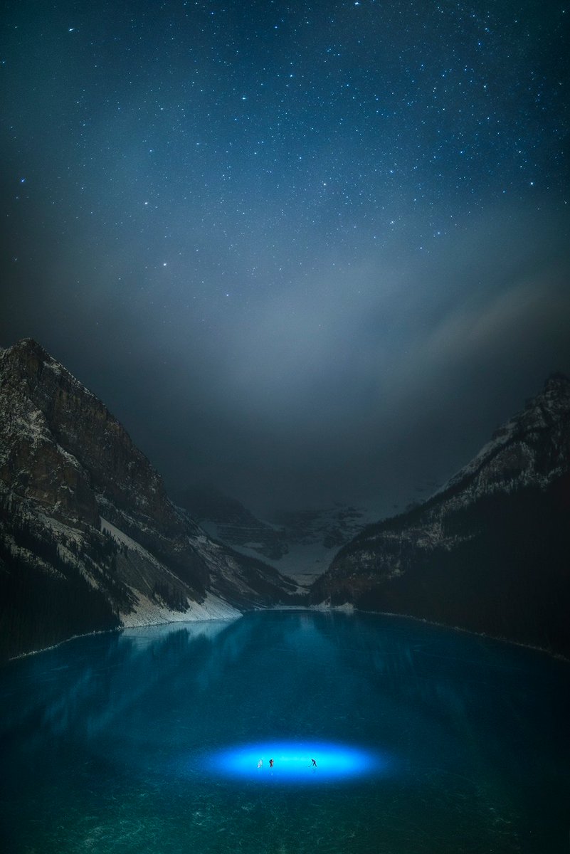 CBCEyeopener's tweet photo. Wow, check out this amazing photo that #Banff photographer @PaulZizkaPhoto snapped while wild skating on Lake Louise! We were just chatting with him about the short but mesmerizing season for skating on Alberta's mountain lakes. https://t.co/V2mojRwkB3